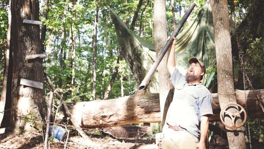 Bob Martin as Ezell with frack pip in Clear Creak Creatives Ezell ballad of a land man