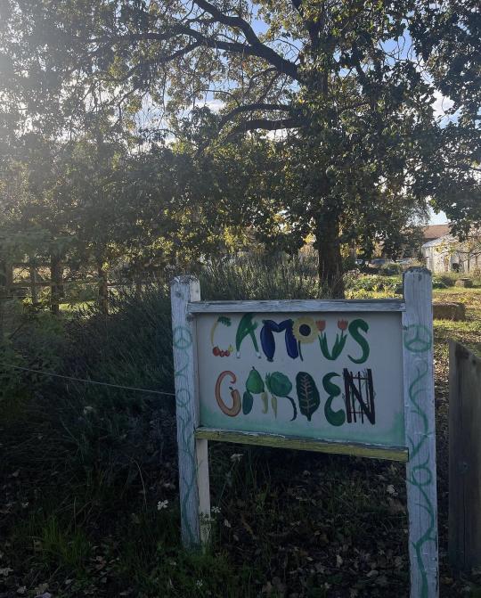 Multicolored sign for the Campus Garden